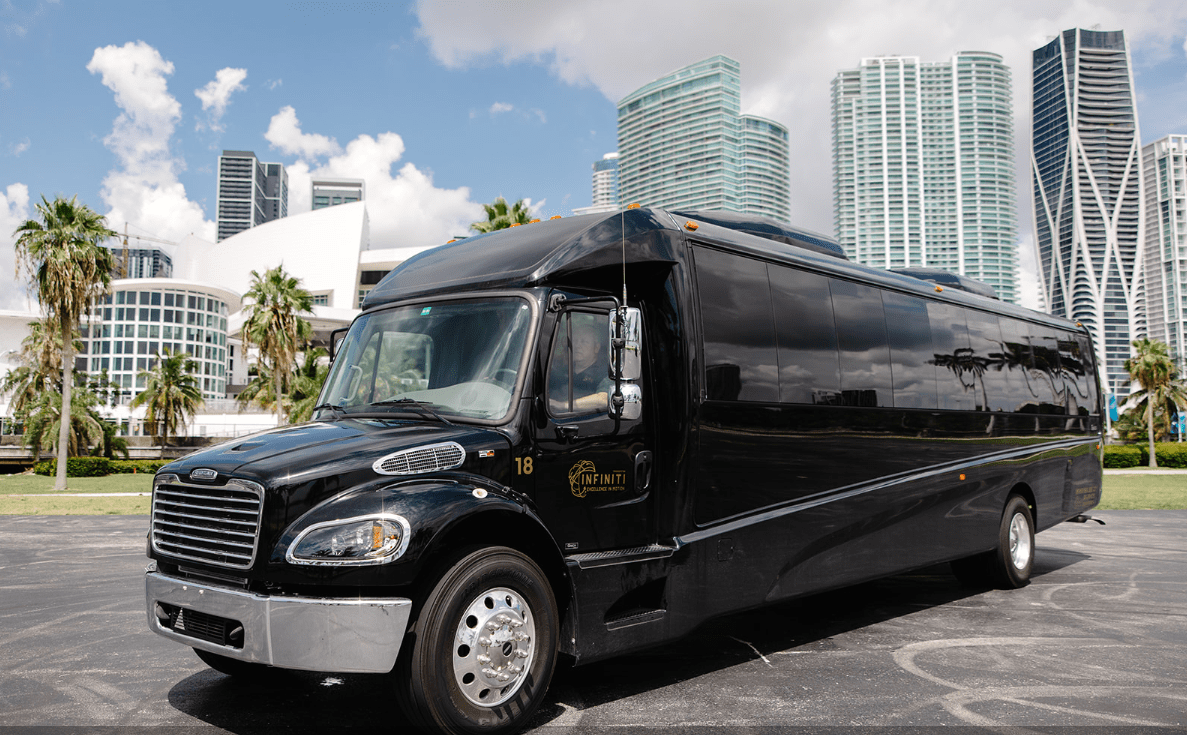 Black shuttle bus in Miami with palm trees