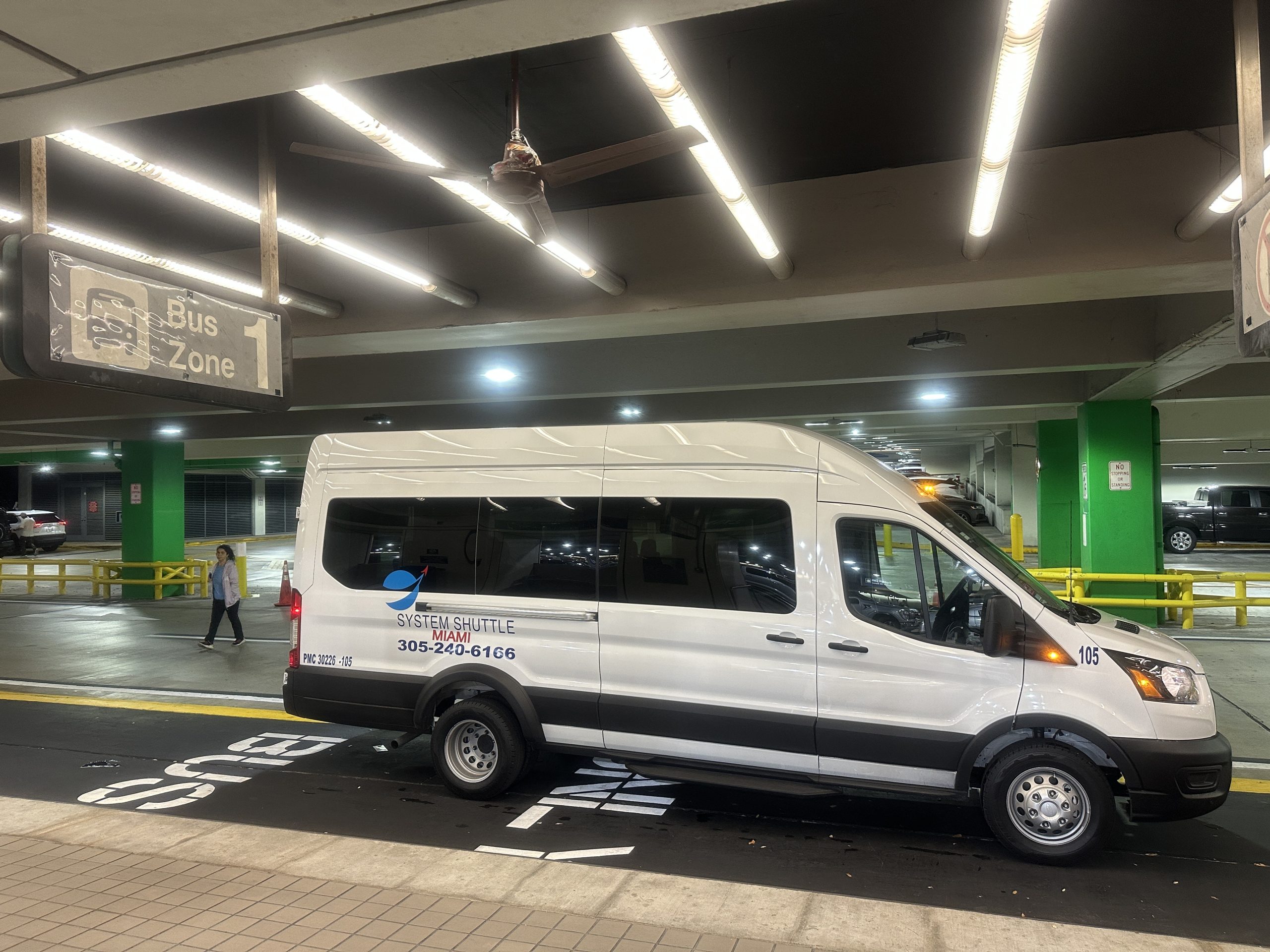 Shuttle service vehicle outside airport terminal