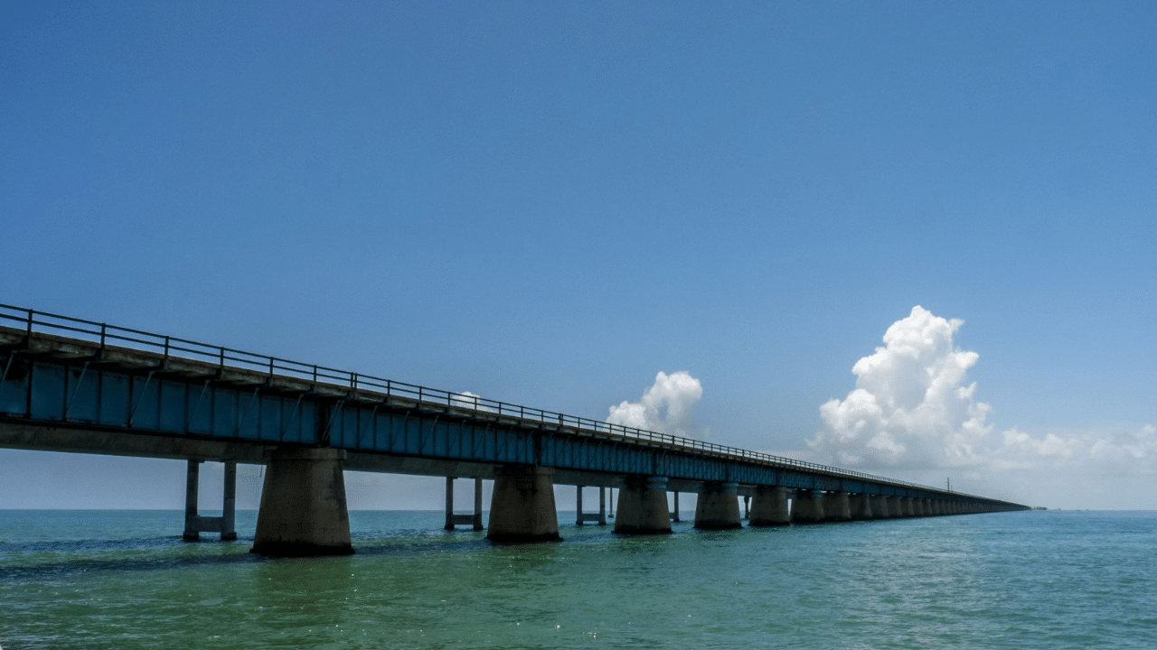 Historic Henry Flagler Overseas Railway bridge structure crossing ocean water.
