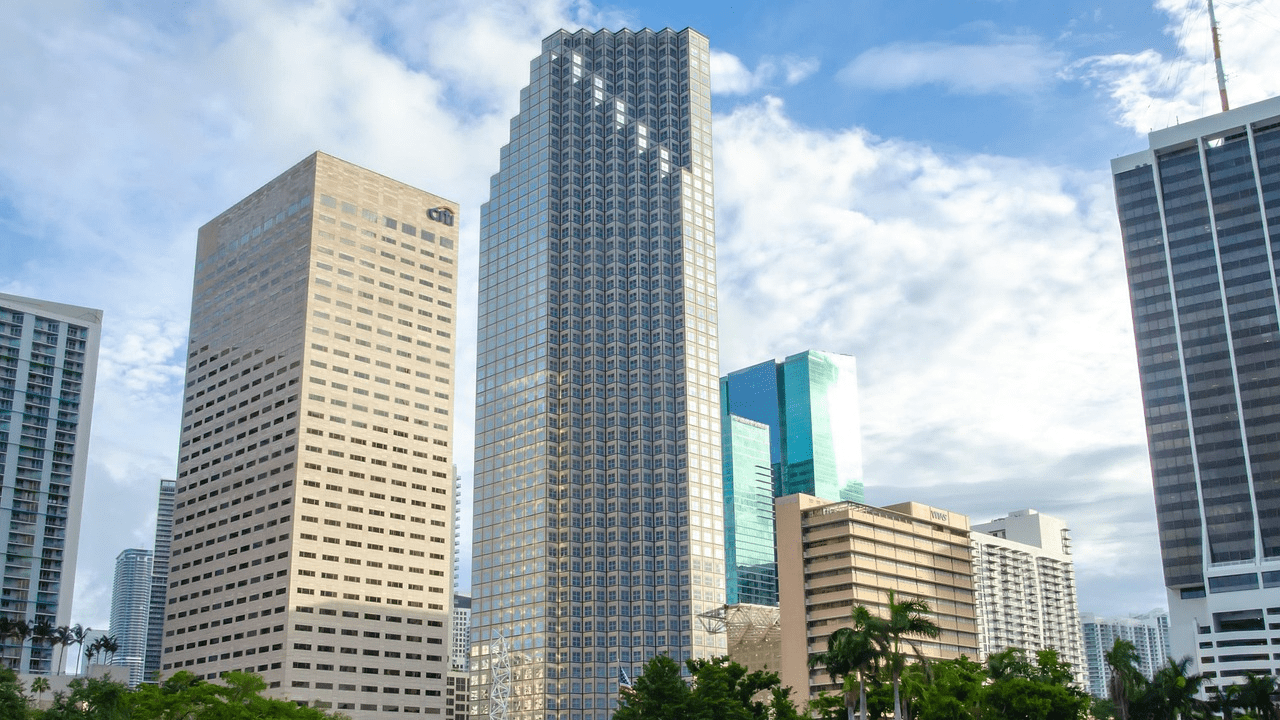 Modern skyscrapers and palm trees in downtown Miami, Florida.