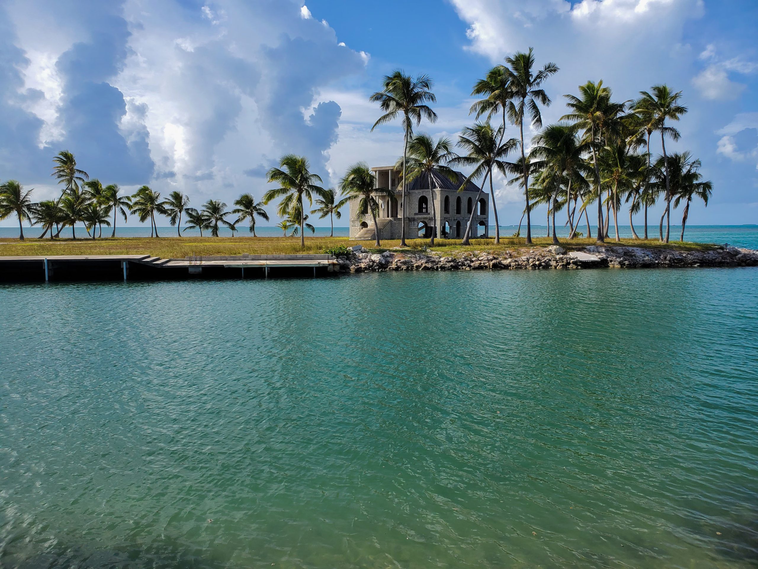 Tropical Florida Keys coastline with palm trees and turquoise ocean water